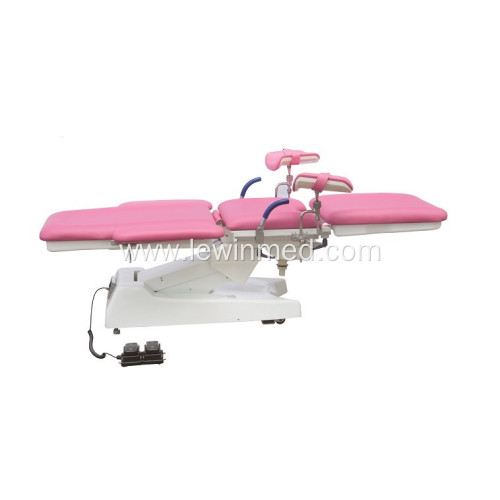 Red color gynecology table for obstetric examination